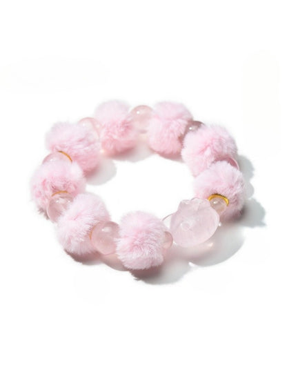 Lovra sweet beaded bracelet displayed with soft lighting highlighting bead colors