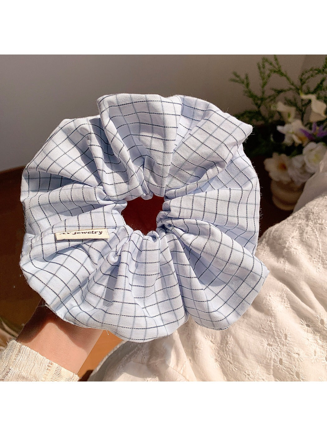 Gifty Lazy Style scrunchie displayed flat highlighting fabric texture
