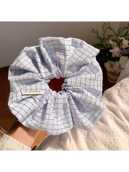 Gifty Lazy Style scrunchie displayed flat highlighting fabric texture
