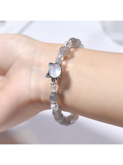 Side view of Lovra minimalist bracelet showing gray crystal beads and silver accents