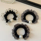 Set of trendy hair ties with plaid and polka dot patterns in various colors