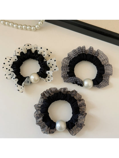 Set of trendy hair ties with plaid and polka dot patterns in various colors