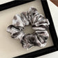 Side view of Gifty Dreamy Silky Retro Scrunchie showing gathered fabric and elastic band