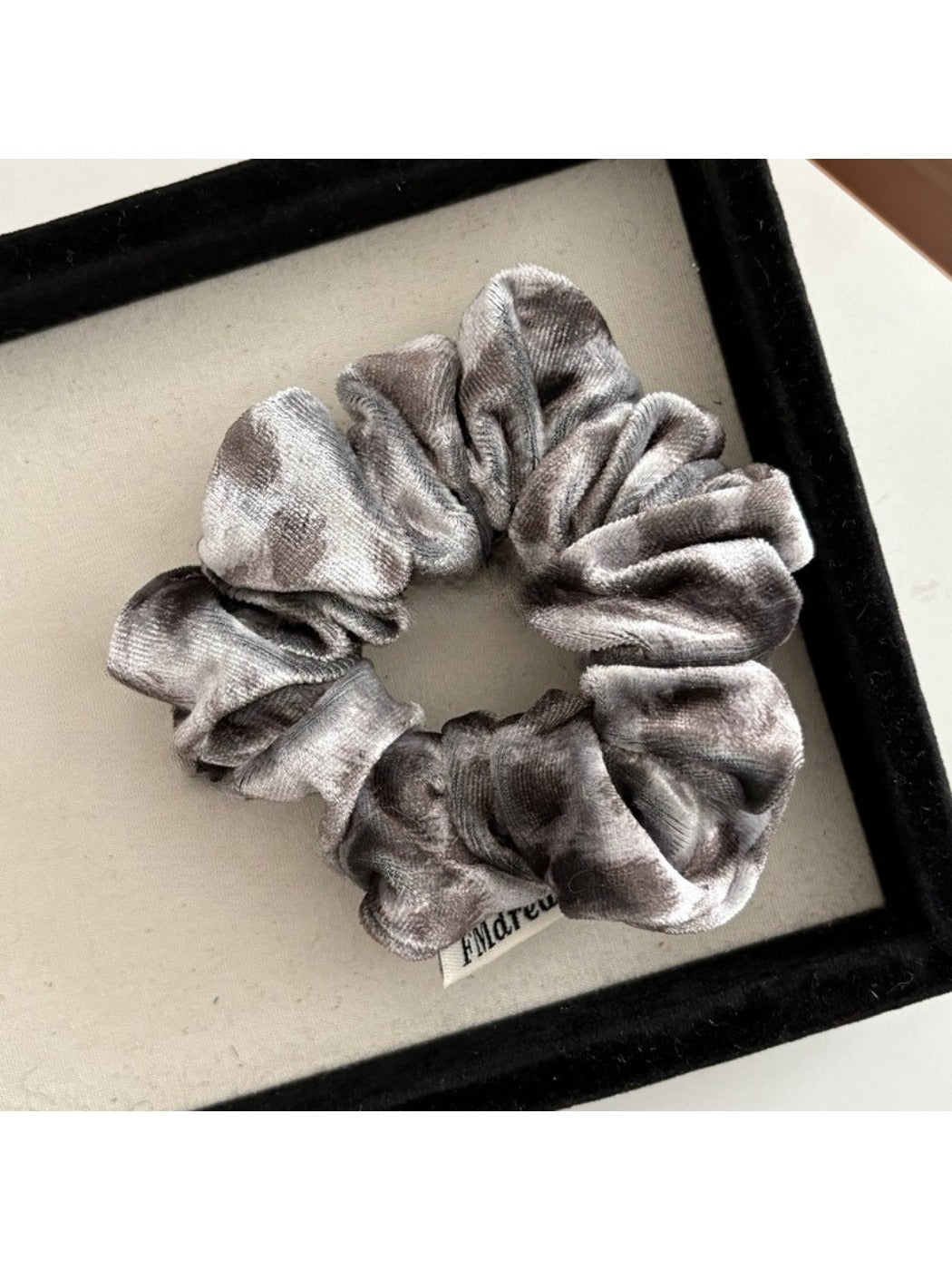 Side view of Gifty Dreamy Silky Retro Scrunchie showing gathered fabric and elastic band