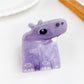 Beau hair claw clip shaped like a cat in matte pink finish on neutral background