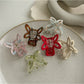 Beau butterfly claw clip open, displaying inner clasp and hinge details