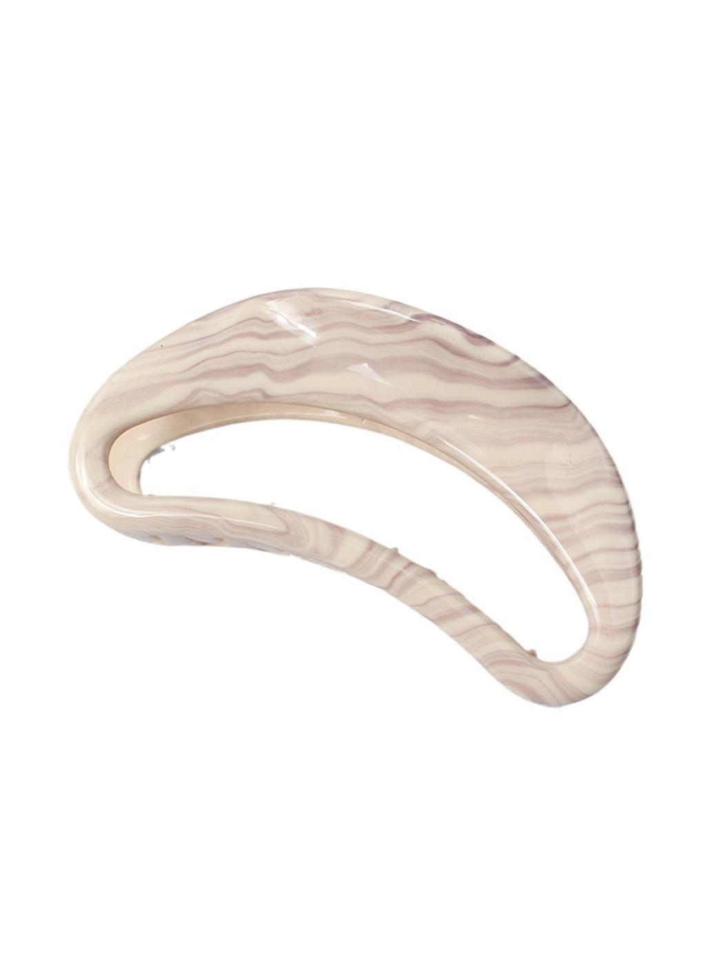 Beau hair clip displayed with natural lighting emphasizing metallic texture