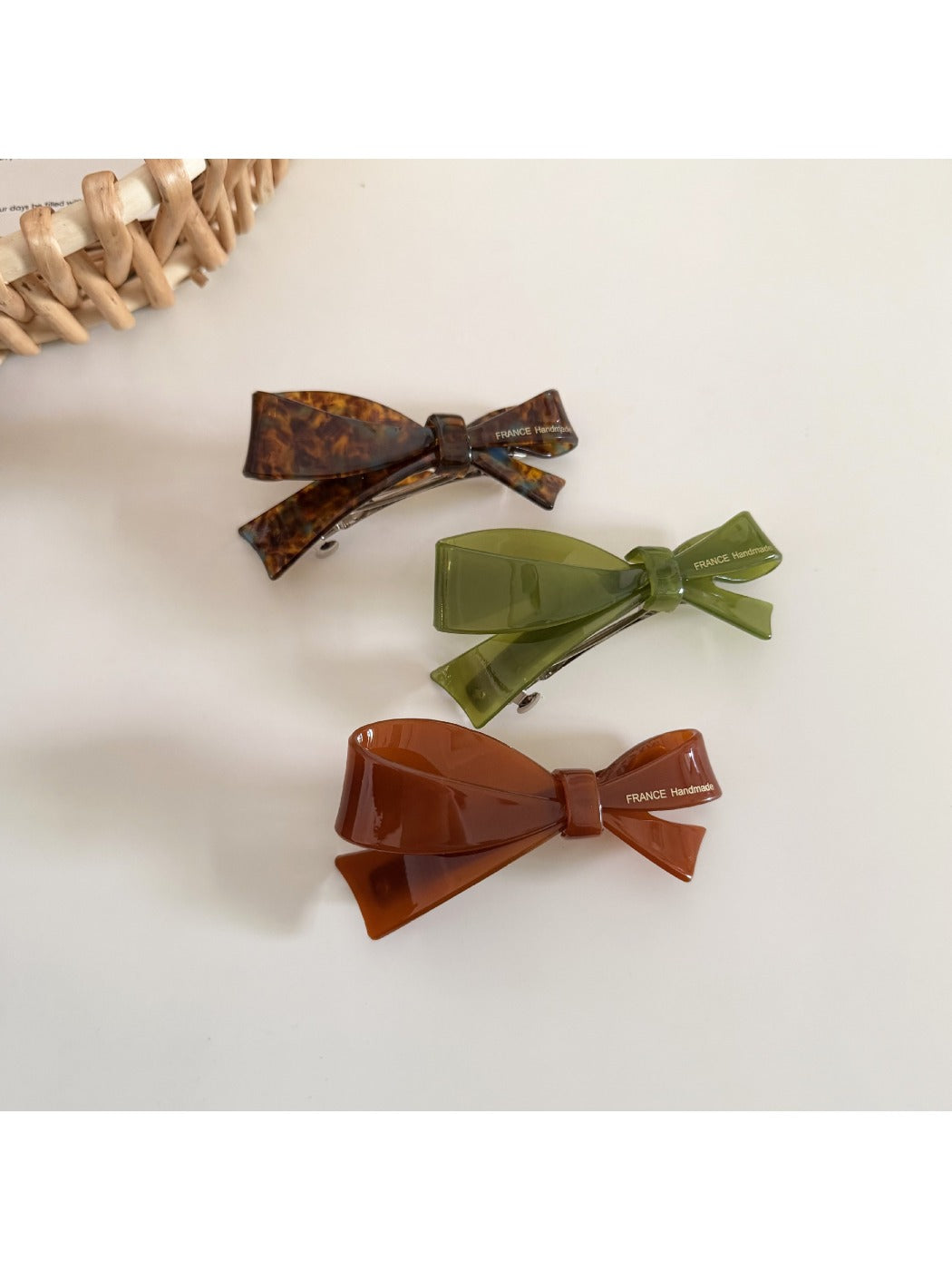Beau hair clip worn in long brown hair styled in loose waves