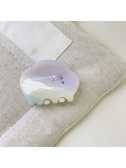Top view of Beau cloud shaped hair claw clip highlighting curved edges