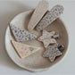 Close-up of Beau triangle star hair clip showing detailed star print and smooth texture
