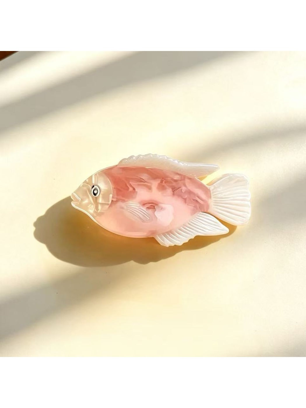Beau creative fish claw clip in pastel yellow with open jaws