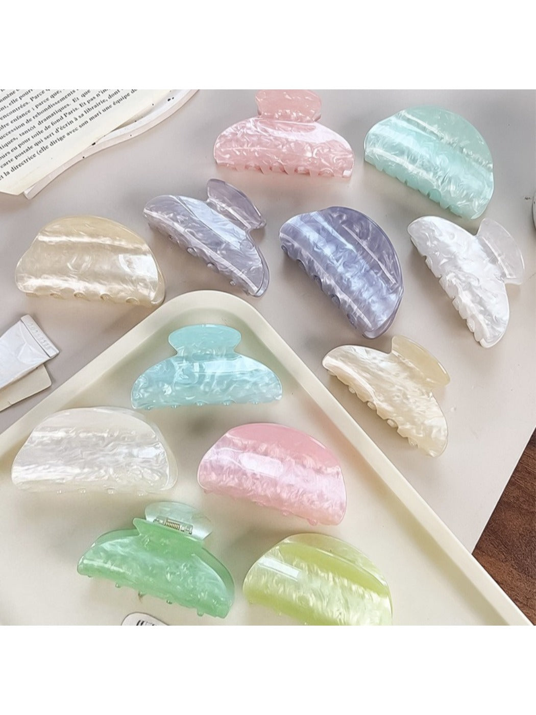 Side view of Beau macaron colored crescent claw clip highlighting curved design