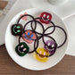 Gifty - Stylish Smiley Face Hair Tie