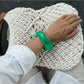 Top view of Lovra irregular shaped bangle bracelet illustrating its open-ended design