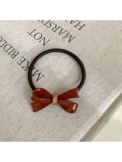 Gifty - Acrylic Bow Hair Tie