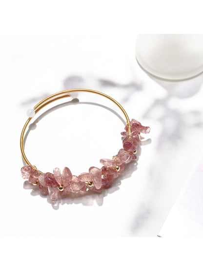 Detailed shot of individual crystal charms on Lovra bracelet