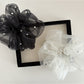 Side view of Gifty elegant chic tulle scrunchie showing layered tulle texture