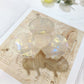 Beau Sweet Acetate Medium Flower Claw Clip positioned to show clip teeth and grip