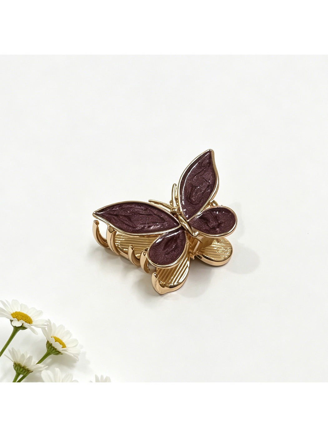 Model wearing Beau butterfly hair clip styled with loose waves