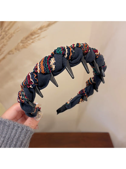 Top view of Gifty knitted fabric wrapped headband highlighting fabric pattern