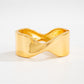 Lovra vintage marble pattern wide bracelet shown with matching accessories on table