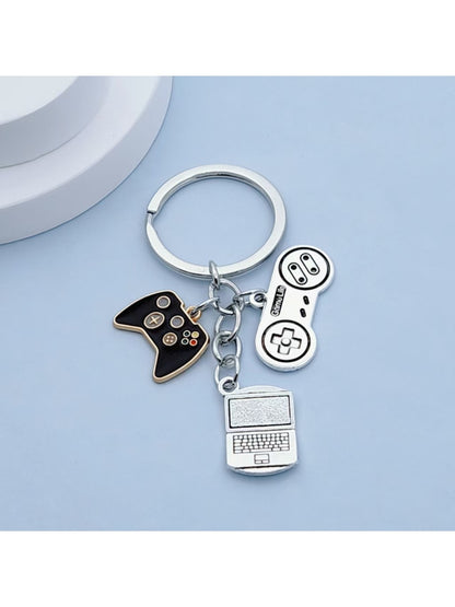 Keypus keychain attached to a set of keys, highlighting its compact size and design