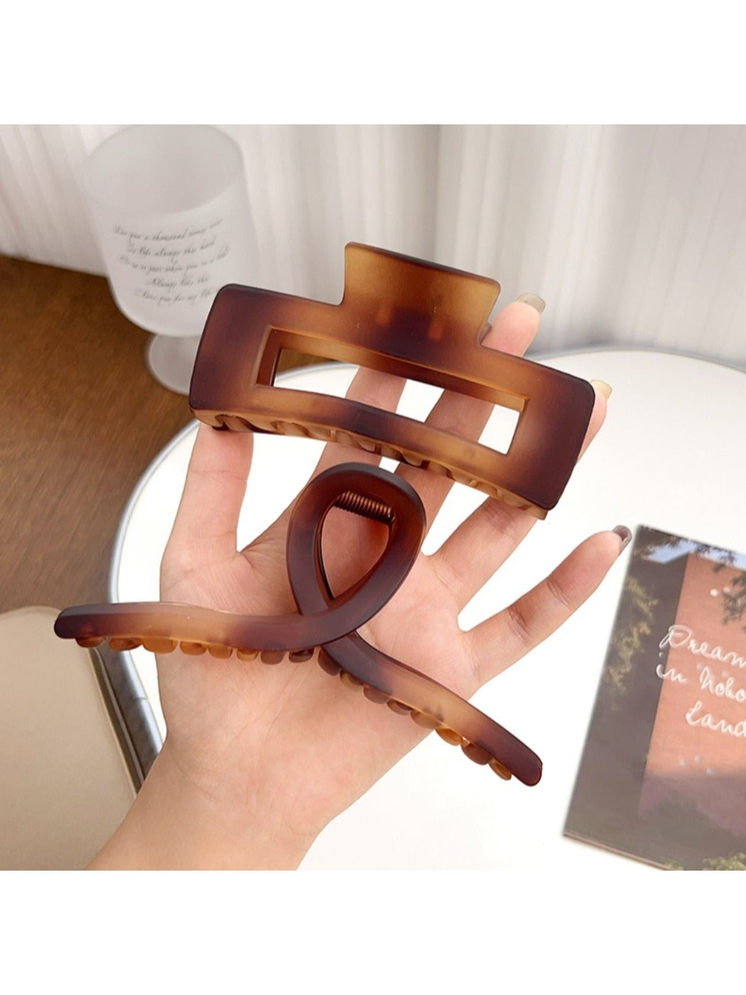 Top view of Beau square crisscross hair claw clip highlighting geometric design