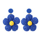 Earedge cute flower shaped knitted earrings styled with casual outfit