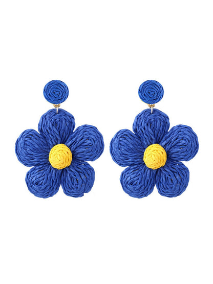 Earedge cute flower shaped knitted earrings styled with casual outfit