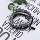 Lovra vintage chic beaded bracelet coiled to display flexible design and craftsmanship