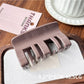 Beau plastic square claw clip in natural light showing color details