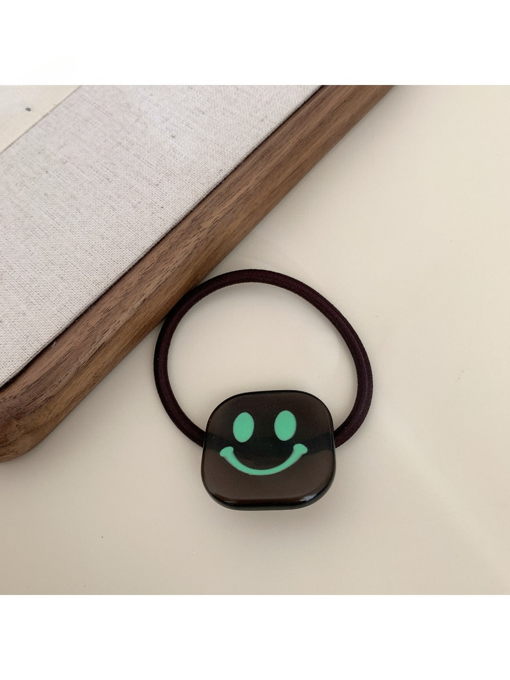 Gifty - Block Smiley Face Hair Tie