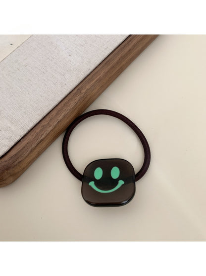 Gifty - Block Smiley Face Hair Tie