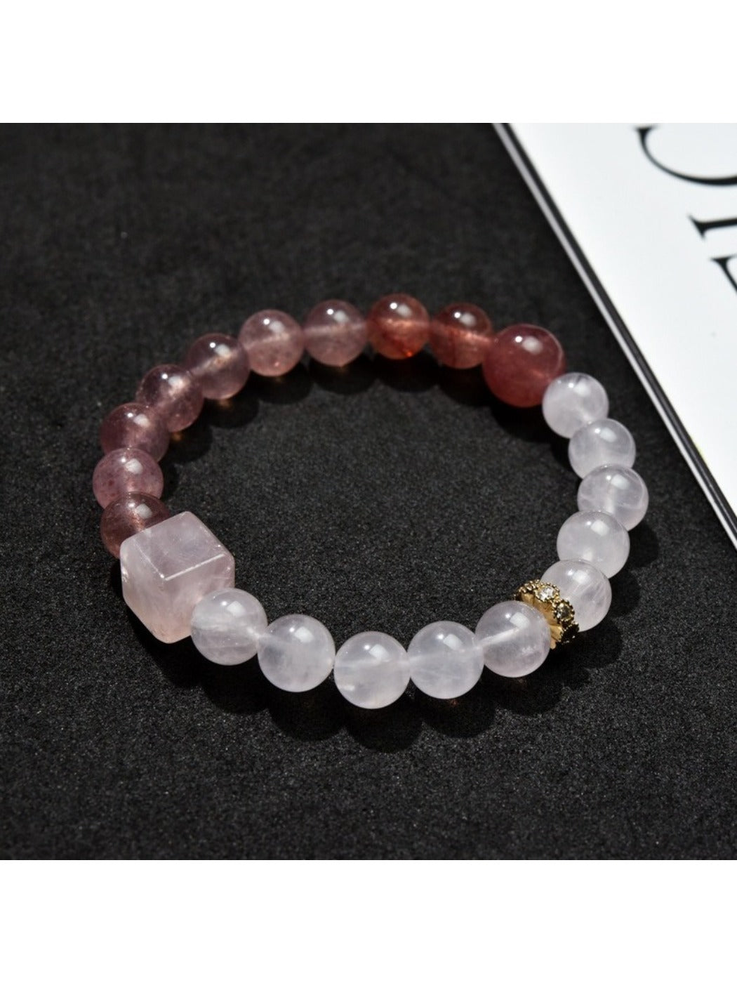 Lovra bracelet displayed flat on a white surface highlighting bead colors and pattern