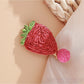 Beau raffia woven hair clip styled in a model's hair