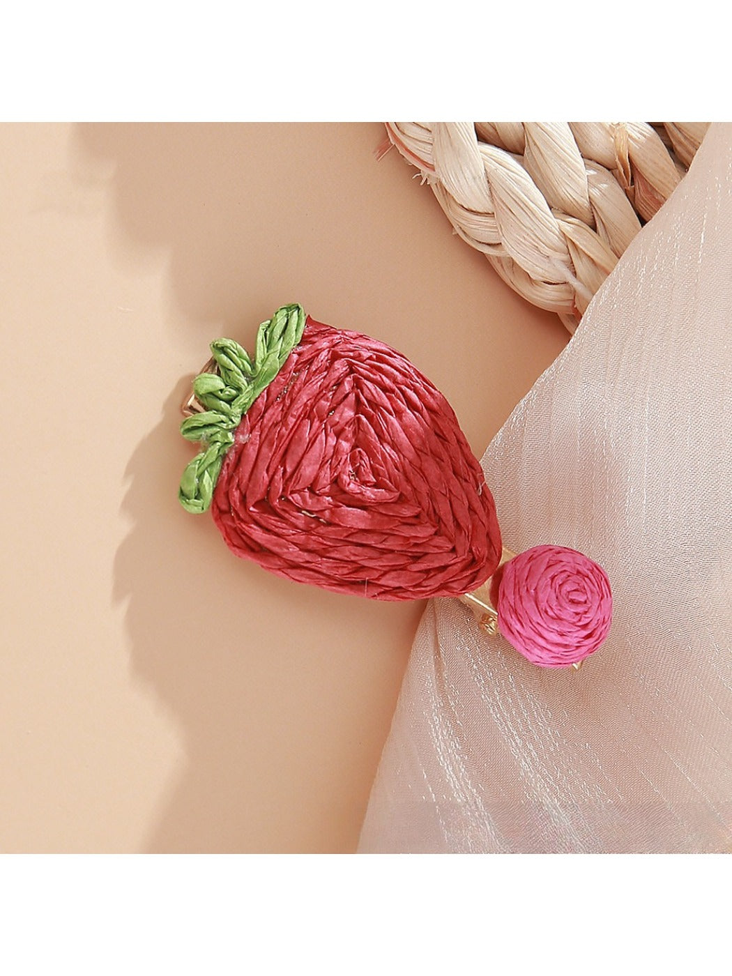 Beau raffia woven hair clip styled in a model's hair