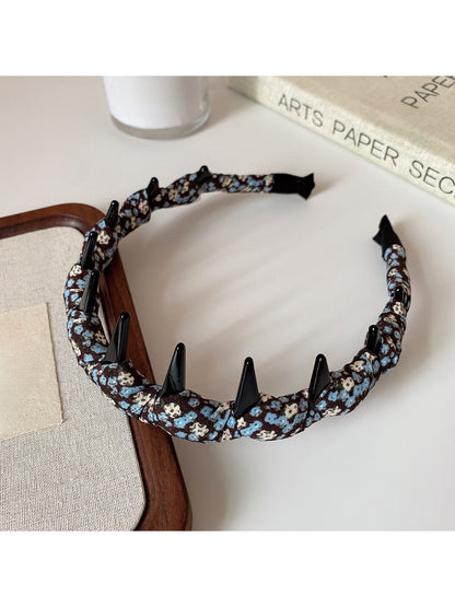 Floral headband displayed on white background showing full shape