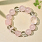 Lovra pink beaded bracelet worn on wrist showing delicate design and gold accents