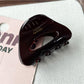 Beau claw clip in use, securing medium-length hair from the back