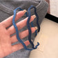 Close-up of denim fabric texture on the wave headband