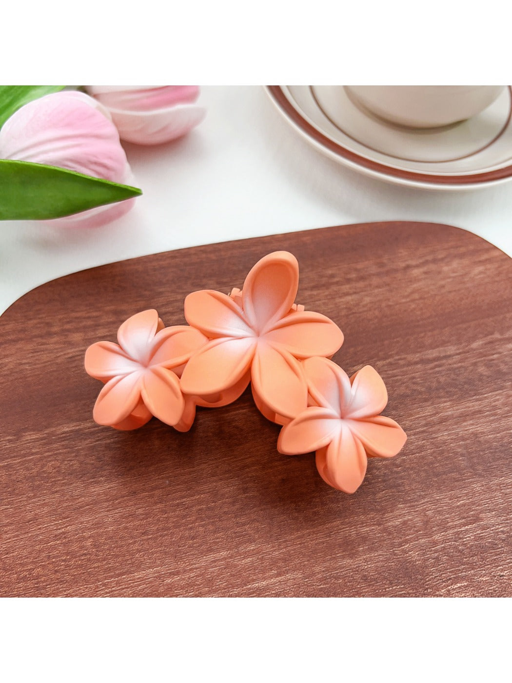 Beau Sweet Three Flower Hair Claw Clip displayed with flowers for aesthetic