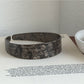 Gifty vintage wide headband folded to show inner lining and fabric texture