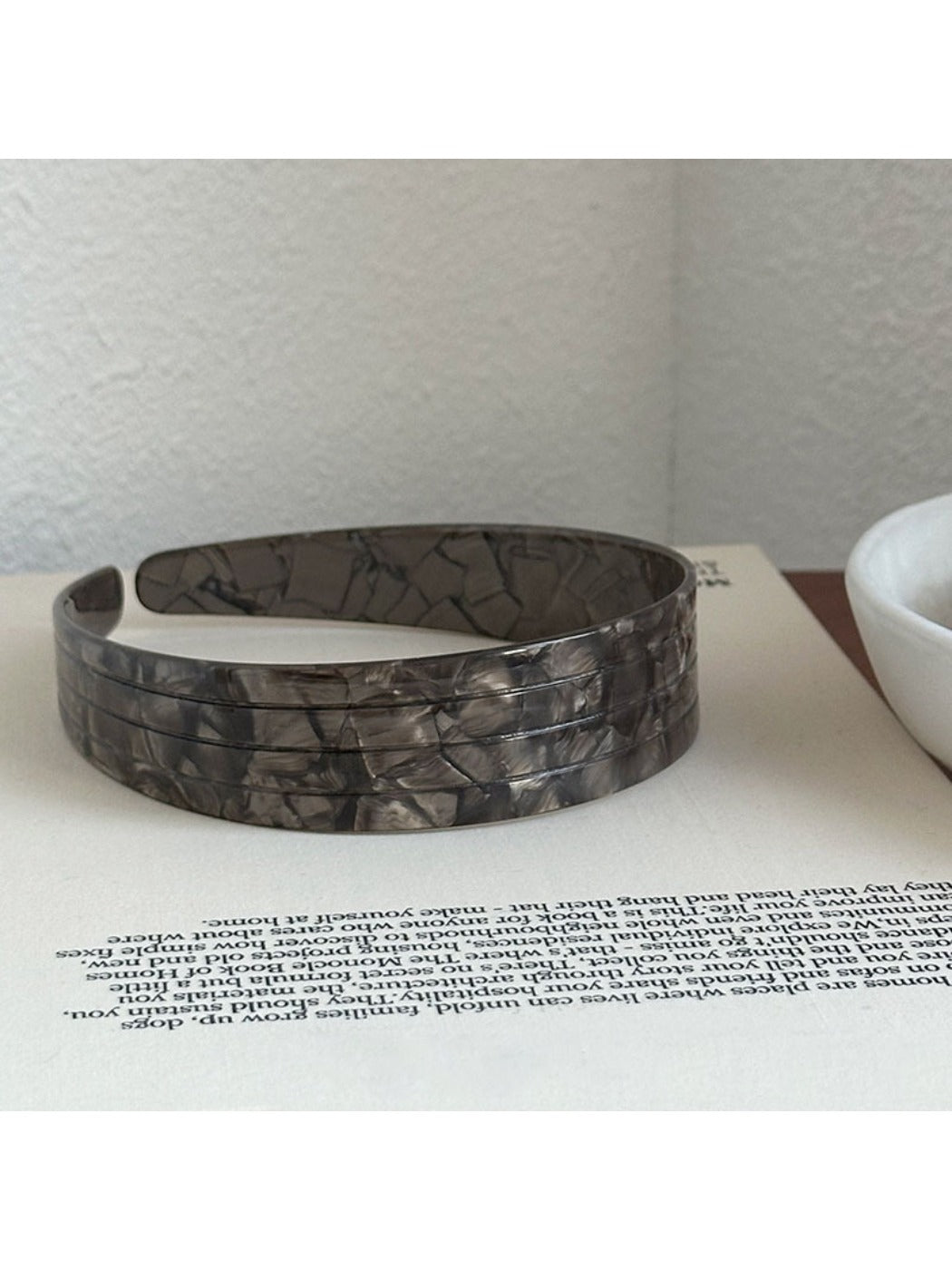 Gifty vintage wide headband folded to show inner lining and fabric texture
