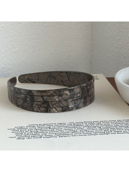 Gifty vintage wide headband folded to show inner lining and fabric texture