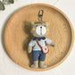 Bear charm keychain displayed on a white background with soft shadows