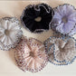 Close-up of Gifty color block tulle scrunchie with bound edges in pastel shades