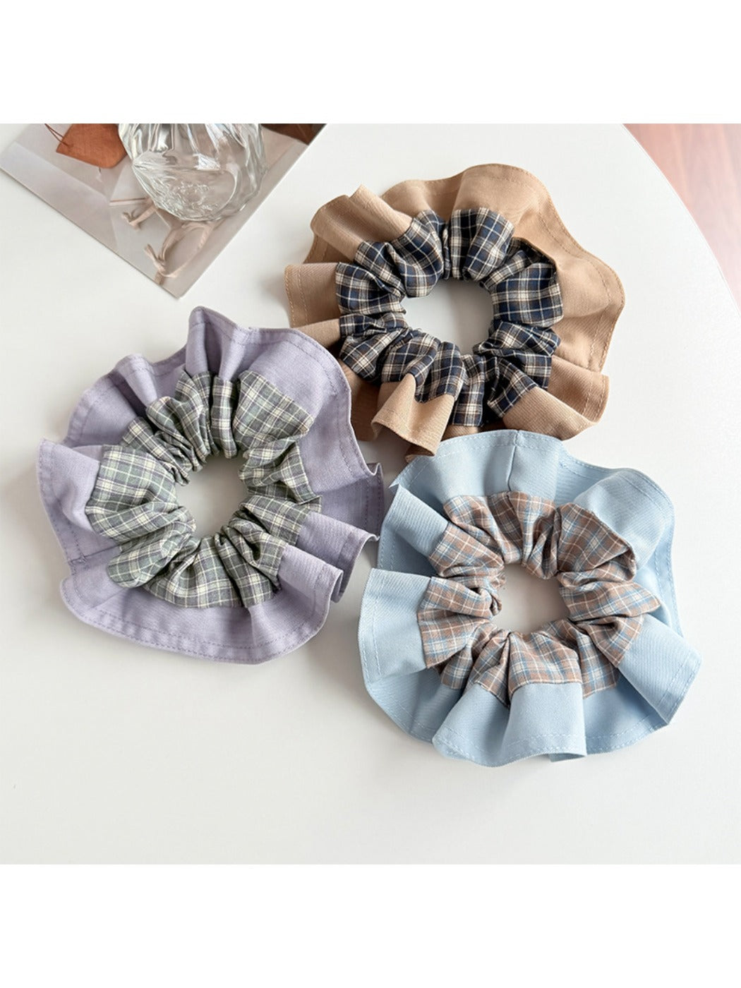 Gifty color block plaid scrunchie in red, green, and beige tones on white background