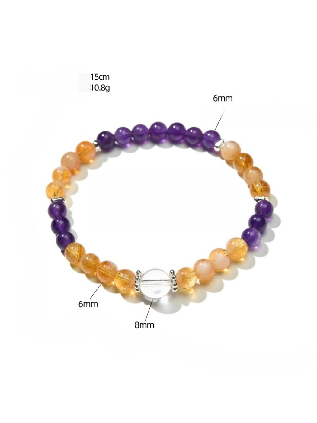 Lovra bracelet with purple and yellow crystals reflecting light on a neutral surface