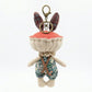 Keypus fabric doll keychain showing colorful embroidered details on the outfit