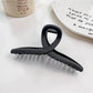 Beau hair claw clip open showing teeth and spring mechanism